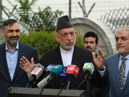 Former Afghan President Hamid Karzai (C) speaks next to Chairman of the High Council for National Reconciliation Abdullah Abdullah (R) during a press conference at Hamid Karzai International Airport in Kabul on July 16, 2021. (Photo by Sajjad HUSSAIN / AFP) (Photo by SAJJAD HUSSAIN/AFP via Getty Images)