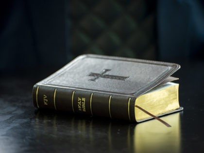 Holy bible book on black desk in church,prepare to study bible in christian religion.