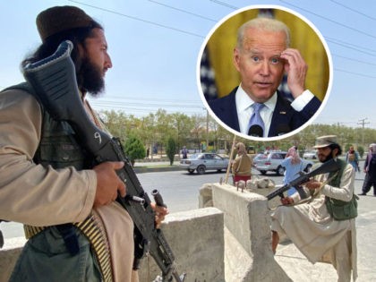 TOPSHOT - Taliban fighters stand guard at an entrance gate outside the Interior Ministry in Kabul on August 17, 2021. (Photo by Javed Tanveer / AFP) (Photo by JAVED TANVEER/AFP via Getty Images) WASHINGTON, DC - AUGUST 12: U.S. President Joe Biden delivers remarks during an East Room event at …