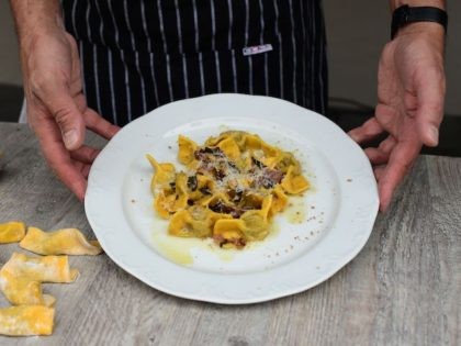 Chef Samuel Perico, of the 'Trattoria Sant'Ambroeus' in Bergamo's upper city, shows typical pasta dish "I Casoncelli" on June 16, 2020. - Bergamo, which was hit hard by the coronavirus epidemic, is a martyred city that is now trying to relearn how to live, especially with its football team which …