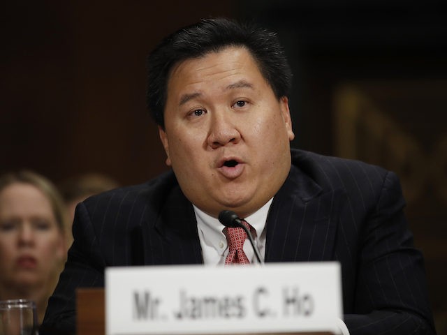 James Ho testifies during a Senate Judiciary Committee hearing on nominations on Capitol Hill in Washington, Wednesday, Nov. 15, 2017. Ho has been nominated to be United States Circuit Judge For The Fifth Circuit. (AP Photo/Carolyn Kaster)