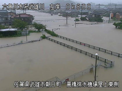 This image made from a CCTV video of Ministry of Land, Infrastructure, Transport and Tourism Kyushu Regional Development Bureau, shows submerged area near the Takeo river in Takeo city, Saga prefecture following the heavy rain, Saturday, Aug. 14, 2021. Torrential rain continued to trigger floods Saturday in wide areas of …