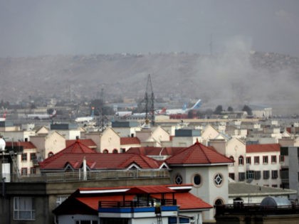 Smoke rises from a deadly explosion outside the airport in Kabul, Afghanistan, Thursday, Aug. 26, 2021. Two suicide bombers and gunmen have targeted crowds massing near the Kabul airport, in the waning days of a massive airlift that has drawn thousands of people seeking to flee the Taliban takeover of …