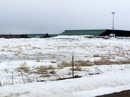 This March 11, 2020 photo provided by the Bureau of Land Management shows a storage yard north of Saco, Mont., for pipe that will be used in construction of the Keystone XL oil pipeline near the U.S.-Canada border. A Canadian company said Monday, April 6, 2020, that it's started construction …