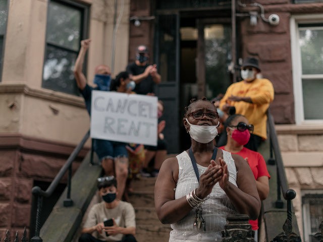 NEW YORK, NY - JULY 31: Housing activists gather to protest alleged tenant harassment by a