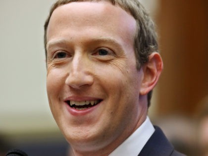 Mark Zuckerberg shows Congress his teeth