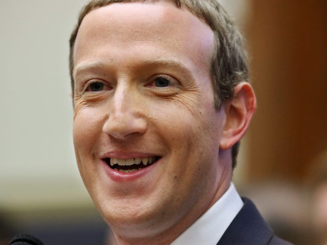 Mark Zuckerberg shows Congress his teeth