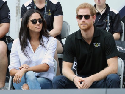TORONTO, ON - SEPTEMBER 25: Prince Harry (R) and Meghan Markle (L) attend a Wheelchair Tennis match during the Invictus Games 2017 at Nathan Philips Square on September 25, 2017 in Toronto, Canada (Photo by Chris Jackson/Getty Images for the Invictus Games Foundation )