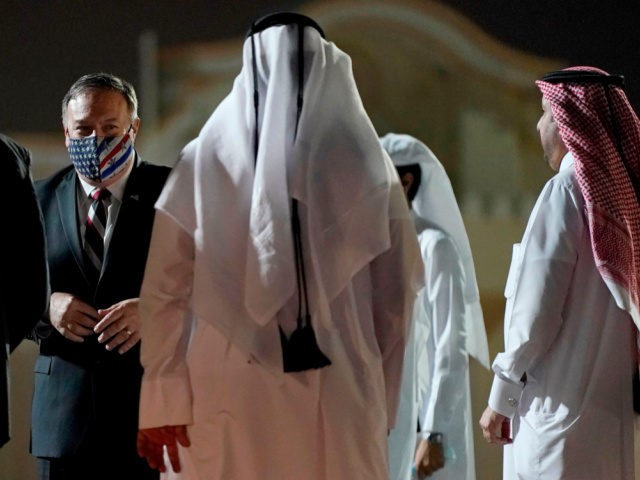 US Secretary of State Mike Pompeo prepares to board his plane at the Old Doha International airport in the Qatari capital Doha, on November 21, 2020. - Pompeo met with negotiators from the Afghan government and the Taliban in Qatar, and will finish his tour with a stop in Saudi …