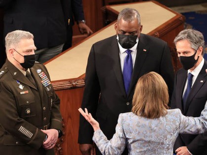 WASHINGTON, DC - APRIL 28: Speaker of the House Nancy Pelosi (D-CA) talks with (L-R) Chairman of the Joint Chiefs of Staff Gen. Mark Milley, Defense Secretary Lloyd Austin and Secretary of State Antony Blinken following President Joe Biden's address of a joint session of Congress in the House chamber …