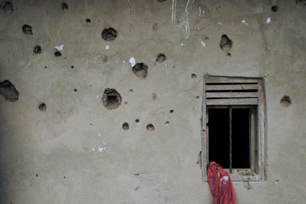 This photograph taken on May 24, 2021 shows the wall of a house riddled with bullets in Nzenga, which has been repeatedly attacked by the armed group Allied Democratic Forces (ADF), Beni Territory, Rwenzori Sector, northeastern Democratic Republic of Congo. - Since December 2020, several dozen deadly attacks have taken place at the foot of the Rwenzori Mountains and in surrounding villages. Since October 2019 and the launch of "large-scale" military operations in Beni Territory, the armed group Allied Democratic Forces (ADF), originally from Uganda and claiming to be a branch of the Islamic State organization, has increased its deadly attacks and killed over 1,200 people. In March 2021, the U.S. State Department listed the ADF as an international terrorist organization affiliated with ISIS, and designated it as ISIS-DRC. (Photo by ALEXIS HUGUET / AFP) (Photo by ALEXIS HUGUET/AFP via Getty Images)