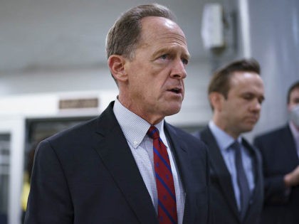 Sen. Pat Toomey, R-Pa., arrives for votes on amendments to advance the $1 trillion biparti