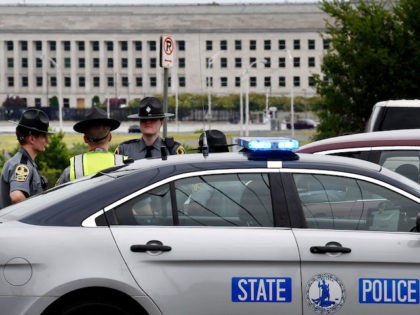Virginia Sate Troopers patrol near the Pentagon after report of an active shooter and lockdown in Washington, DC, on August 3, 2021. - The Pentagon was on lockdown after a shooting at a subway station just outside the secure US military headquarters. Employees in the US Defense Department headquarters in …