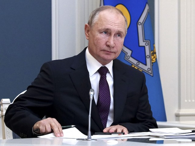 Russian President Vladimir Putin takes part in a virtual meeting with leaders of the Collective Security Treaty Organisation to discuss the situation in Afghanistan in Moscow, Russia, Monday, Aug. 23, 2021. (Evgeniy Paulin, Sputnik, Kremlin Pool Photo via AP)