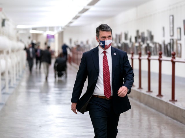 WASHINGTON, DC - JANUARY 12: Rep. Ronny Jackson (R-TX) wears a protective mask while walking through the Canon Tunnel to the U.S. Capitol on January 12, 2021 in Washington, DC. Today the House of Representatives plans to vote on Rep. Jamie Raskin's (D-MD) resolution calling on Vice President Mike Pence …
