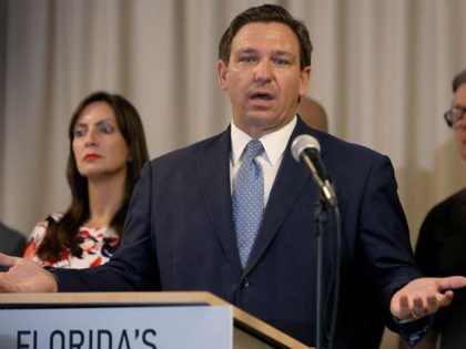 SURFSIDE, FLORIDA - AUGUST 10: Florida Gov. Ron DeSantis speaks during an event to give ou