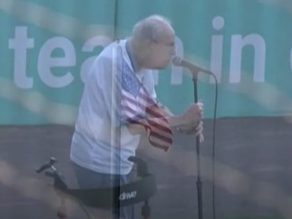 96-year-old John Pylman sings the Star Spangled Banner before the start of the West Michigan Whitecaps game on August 5, 2021 in Comstock Park, Michigan. Screenshot via YouTube.