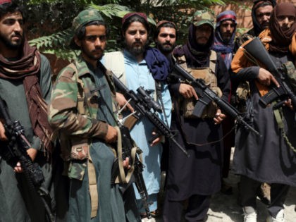 Taliban fighters pose for photograph in Wazir Akbar Khan in the city of Kabul, Afghanistan, Wednesday, Aug. 18, 2021. The Taliban declared an "amnesty" across Afghanistan and urged women to join their government Tuesday, seeking to convince a wary population that they have changed a day after deadly chaos gripped …