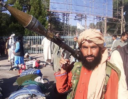 TOPSHOT - In this picture taken on August 13, 2021, a Taliban fighter holds a rocket-prope