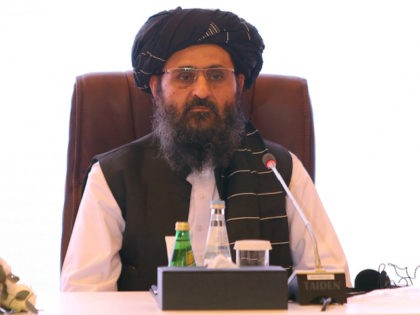 The leader of the Taliban negotiating team Mullah Abdul Ghani Baradar looks on during the final declaration of the peace talks between the Afghan government and the Taliban is presented in Qatar's capital Doha on July 18, 2021. - Representatives of the Afghan government and Taliban insurgents held talks in …
