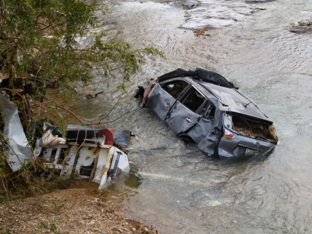 A car and other structure were one of many swept up in a flash flood recently, shown Monda