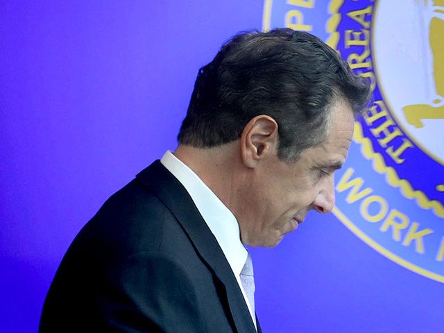 New York State Governor Andrew Cuomo leaves the room after giving his daily coronavirus pr