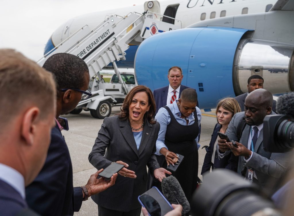 Vice President Kamala Harris takes questions form reporters before boarding Air Force Two at Detroit Metropolitan Wayne County Airport in Romulus after speaking at the TCF Center in downtown Detroit on Monday, July 12, 2021.
