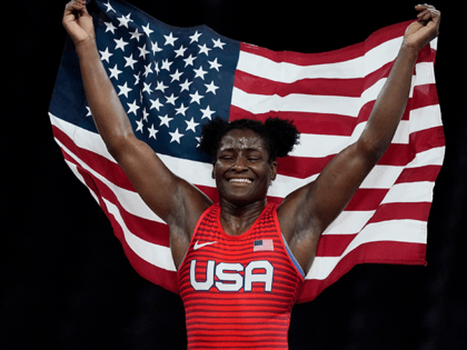 Aug 3, 2021; Chiba, Japan; Tamyra Mensah-Stock (USA) celebrates after defeating Blessing Oborududu (NGR) in the women's freestyle 68kg final during the Tokyo 2020 Olympic Summer Games at Makuhari Messe Hall A.