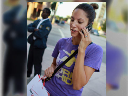 CORAL GABLES, FL - FEBRUARY 10: Julie Bennink makes a phone call on her new iPhone that she had just purchased at a Verizon Wireless stores after they started selling the smart phone on February 10, 2011 in Coral Gables, Florida. AT&T had previously had a monopoly on selling the …