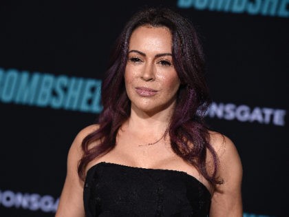 Alyssa Milano attends the premiere of "Bombshell" at Regency Village Theatre on Tuesday, Dec. 10, 2019, in Los Angeles. (Photo by Jordan Strauss/Invision/AP)