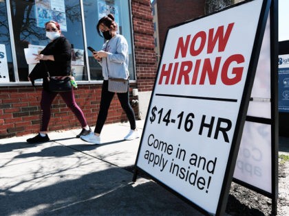 PAWTUCKET, RHODE ISLAND-APRIL 09: A company advertises a help wanted sign on April 09, 2021 in Pawtucket, Rhode Island. Rhode Island consistently ranks as one of the worst states in America for the condition of its infrastructure with an estimated 24% of its roads in poor condition and 23% of …
