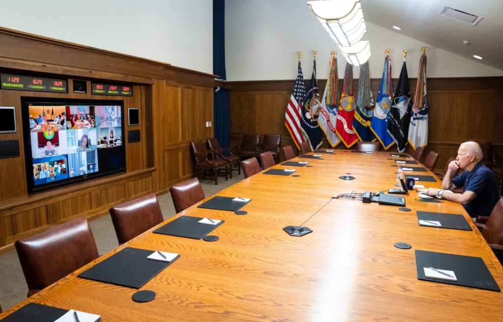 In this photo released by The White House, President Joe Biden meets virtually with his national security team and senior officials for a briefing on Afghanistan, Sunday, Aug. 15, 2021, at Camp David, Md. (The White House via AP)