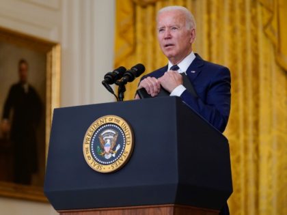 President Joe Biden answers questions from members of the media about the bombings at the