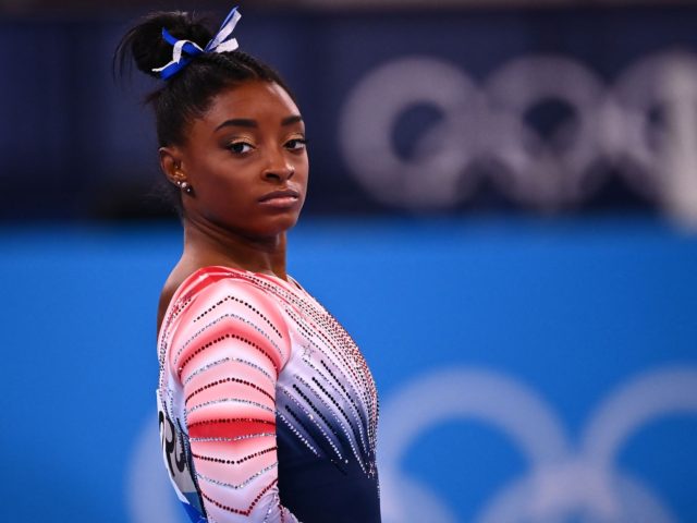 USA's Simone Biles competes in the artistic gymnastics women's balance beam final of the T