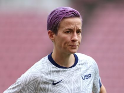 KASHIMA, JAPAN - AUGUST 02: Megan Rapinoe #15 of Team United States looks on as she warms up prior to the Women's Semi-Final match between USA and Canada on day ten of the Tokyo Olympic Games at Kashima Stadium on August 02, 2021 in Kashima, Ibaraki, Japan. (Photo by Naomi …