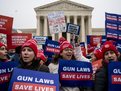 WASHINGTON, DC - DECEMBER 2: Gun safety advocates rally in front of the U.S. Supreme Court before during oral arguments in the Second Amendment case NY State Rifle & Pistol v. City of New York, NY on December 2, 2019 in Washington, DC. Several gun owners and the NRA's New …