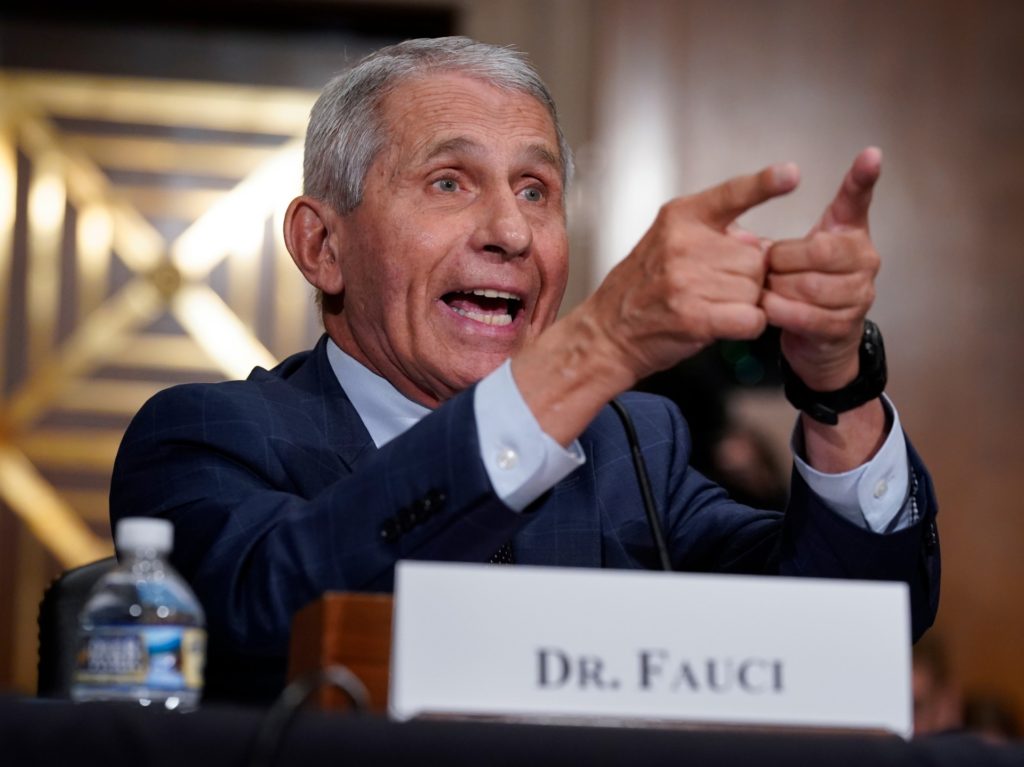 Top infectious disease expert Dr. Anthony Fauci responds to accusations by Sen. Rand Paul, R-Ky., as he testifies before the Senate Health, Education, Labor, and Pensions Committee about the origin of COVID-19, July 20, 2021 on Capitol Hill in Washington, DC. Cases of COVID-19 have tripled over the past three weeks, and hospitalizations and deaths are rising among unvaccinated people. (Photo by J. Scott Applewhite-Pool/Getty Images)