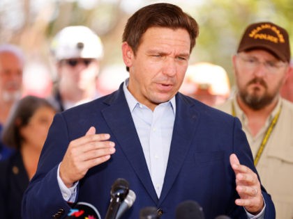 SURFSIDE, FLORIDA - JULY 03: Florida Gov. Ron DeSantis speaks to the media about the 12-story Champlain Towers South condo building that partially collapsed on July 03, 2021 in Surfside, Florida. Over one hundred people are being reported as missing as the search-and-rescue effort continues. (Photo by Michael Reaves/Getty Images)