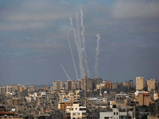 FILE - In this May 20, 2021 file photo, rockets are launched from the Gaza Strip towards I