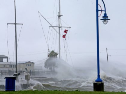 Hurricane flags at the Southern Yacht Club are whipped in the wind on Lake Pontchartrain as the effects of Hurricane Ida begin to be felt in New Orleans on Sunday, Aug. 29, 2021. Nolaidasun03
