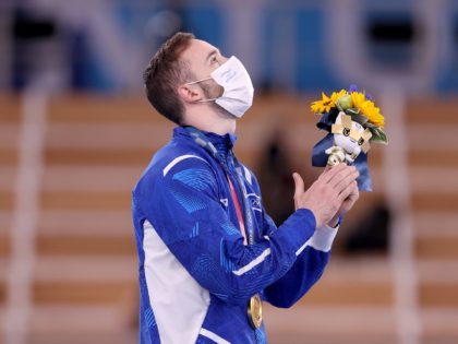 TOKYO, JAPAN - AUGUST 01: Gold medalist Artem Dolgopyat of Team Israel reacts on the podium during the Men's Floor Exercise Victory Ceremony on day nine of the Tokyo 2020 Olympic Games at Ariake Gymnastics Centre on August 01, 2021 in Tokyo, Japan. (Photo by Laurence Griffiths/Getty Images)