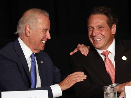 NEW YORK, NY - JULY 27: Vice President Joe Biden (L) appears with New York Gov. Andrew Cuomo to unveil plans for new infrastructure projects on July 27, 2015 in New York City. The highlight of the event was an announcement that a new LaGuardia airport will be built, with …