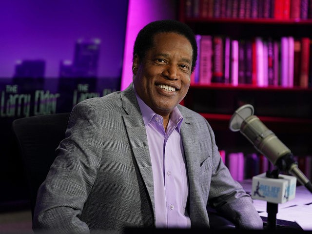 Radio talk show host Larry Elder poses for a photo in his studio, Monday, July 12, 2021, i