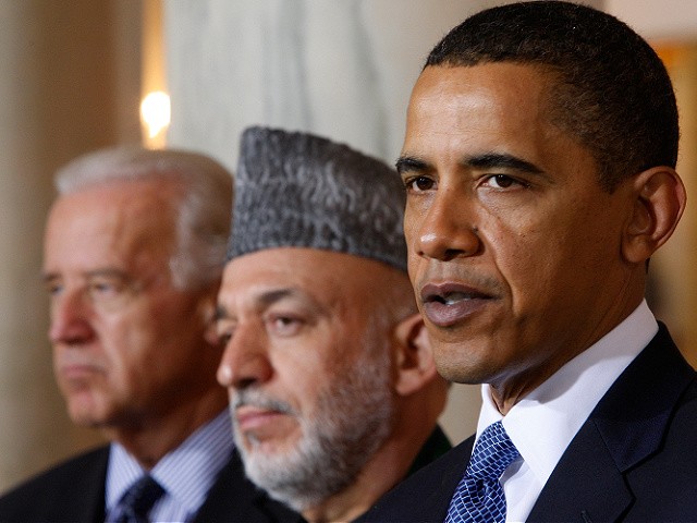 FILE - In this May 6, 2009 file photo, President Barack Obama, accompanied by Vice President Joe Biden, left, and Afghan President Hamid Karzai, makes a statement in the Grand Foyer of the White House after meetings with Karzai and Pakistani President Asif Ali Zardari. After months of rocky relations with the Obama administration, the U.S. and Karzai are getting their partnership back on track. If everyone stays on script during Karzai's visit that starts Monday May 10, 2010, the Afghan president will leave Washington with a renewed sense of legitimacy and the political backing he needs for possible peace talks with the Taliban. (AP Photo/Ron Edmonds, File)