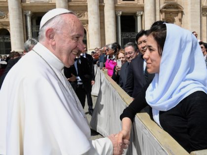 Pope Francis meets Nadia Murad Basee Taha, the Yazidi woman who escaped sexual enslavement by the Islamic State group and went on to become advocate for others, during his weekly general audience, at the Vatican Wednesday, May 3, 2017. (L'Osservatore Romano/Pool Photo via AP)