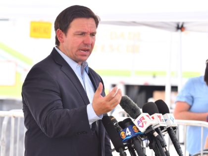 Governor Ron DeSantis, flanked by Lt. Gov. Jeanette Nu ez, Surfside Mayor Charles Burkett and Kevin Guthrie, Florida Division of Emergency Management Director, toured the site of the Champlain Towers South condominium and met with the media. Surfside Condo Day After Demo