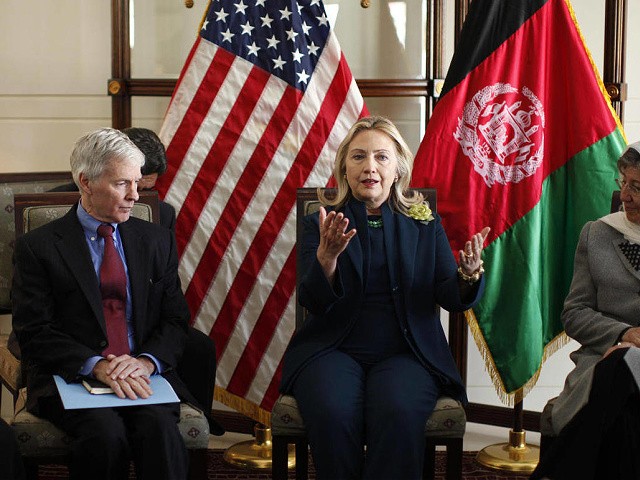 U.S. Secretary of State Hillary Rodham Clinton, center, hosts a Civil Society roundtable discussion at the U.S. Embassy in Kabul, Afghanistan Thursday, Oct. 20, 2011. Flanking Clinton are U.S. Ambassador Ryan Crocker, left, and Dr. Sima Samar. AP Photo/Kevin Lamarque, Pool)