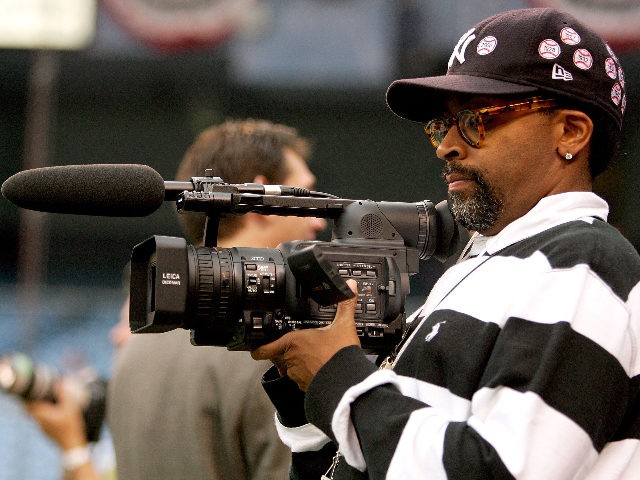 NEW YORK - OCTOBER 03: Filmmaker Spike Lee shoots on his video camera during batting practice prior to game one of the American League Division Series between the New York Yankees and the Detroit Tigers on October 3, 2006 at Yankee Stadium in the Bronx Borough of New York City. …