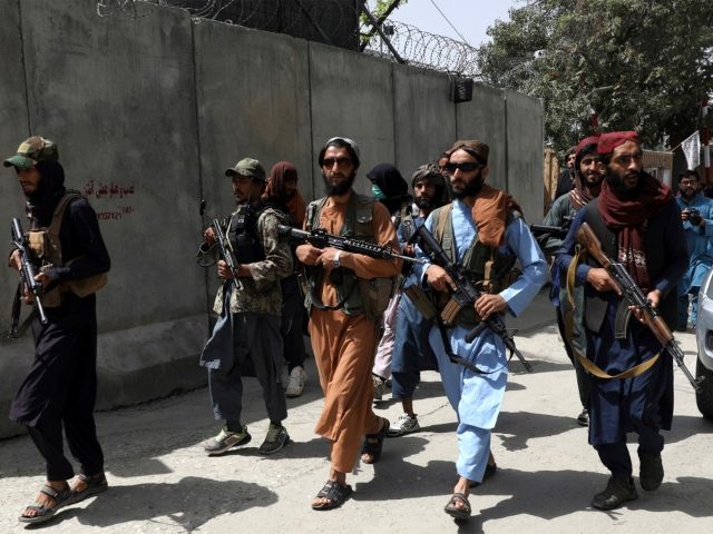 Taliban fighters patrol in Wazir Akbar Khan neighborhood in the city of Kabul, Afghanistan, Wednesday, Aug. 18, 2021. The Taliban declared an "amnesty" across Afghanistan and urged women to join their government Tuesday, seeking to convince a wary population that they have changed a day after deadly chaos gripped the …
