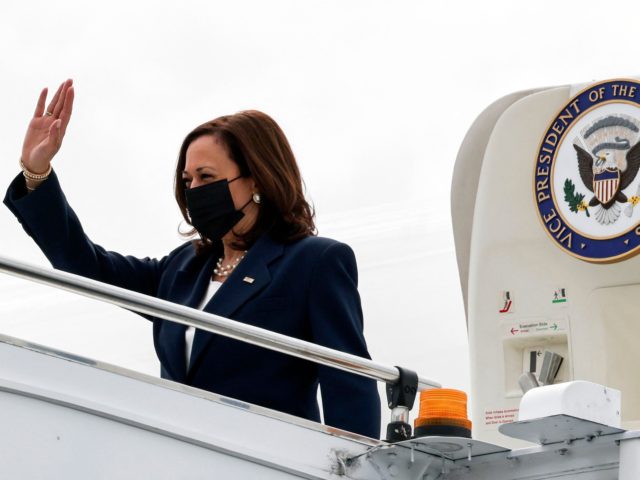 US Vice President Kamala Harris waves upon arrival at Paya Lebar Base airport in Singapore, August 22, 2021. (Photo by EVELYN HOCKSTEIN / POOL / AFP) (Photo by EVELYN HOCKSTEIN/POOL/AFP via Getty Images)